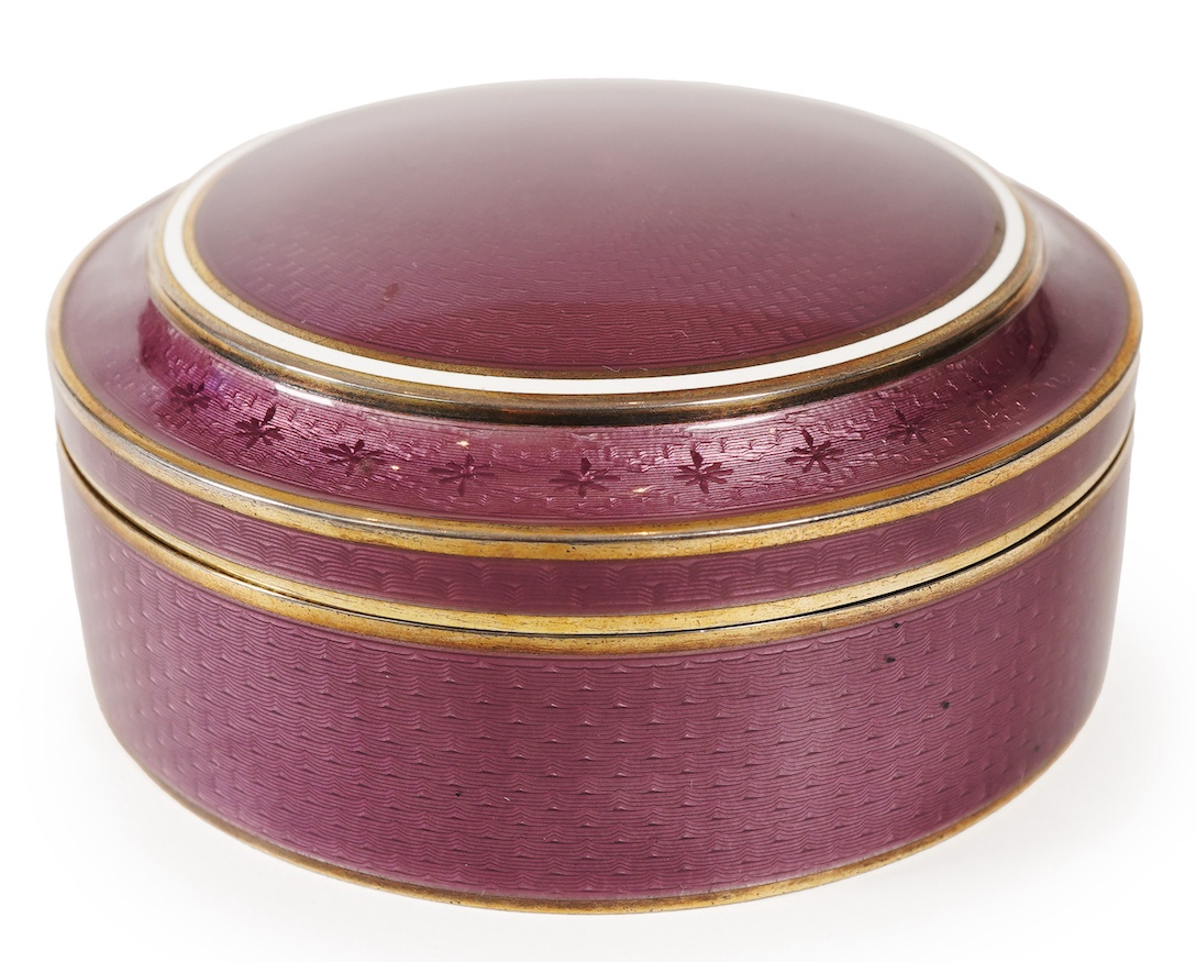 A late 19th/early 20th century North American sterling and mauve guilloche enamel circular box and cover, by Theodore B. Starr Inc, New York